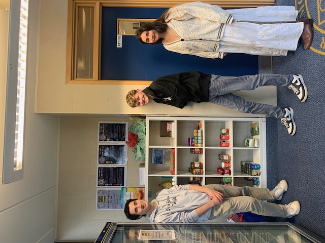 Student volunteers Marcus Arnold, Ed Addis and Anoushka Samanta pictured with the Ashurst Pantry